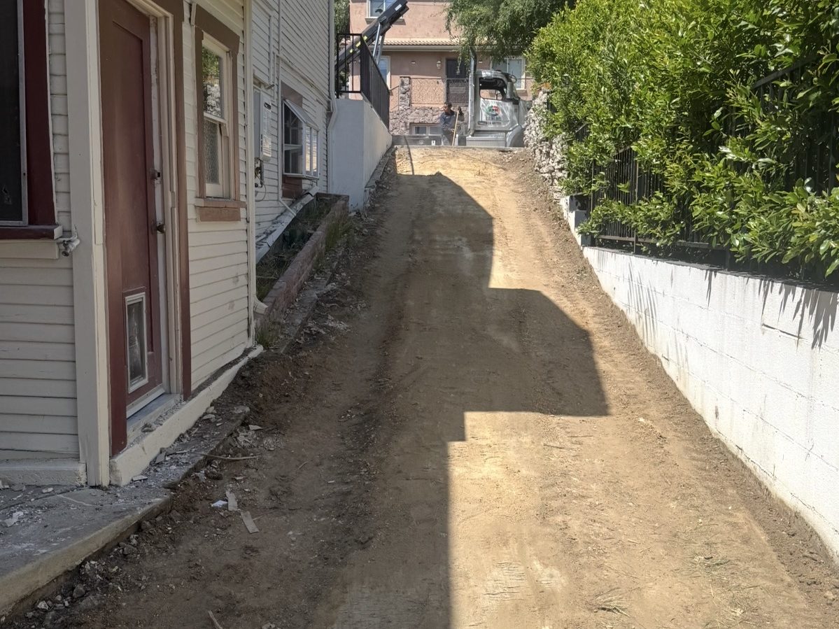 Driveway cleared and graded after removal